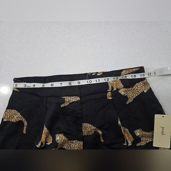 Stylish black wide-leg pants. Features a bold leopard print. - Picture 8 of 15